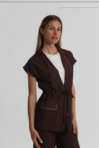 GIACCA CON DETTAGLIO BORCHIE