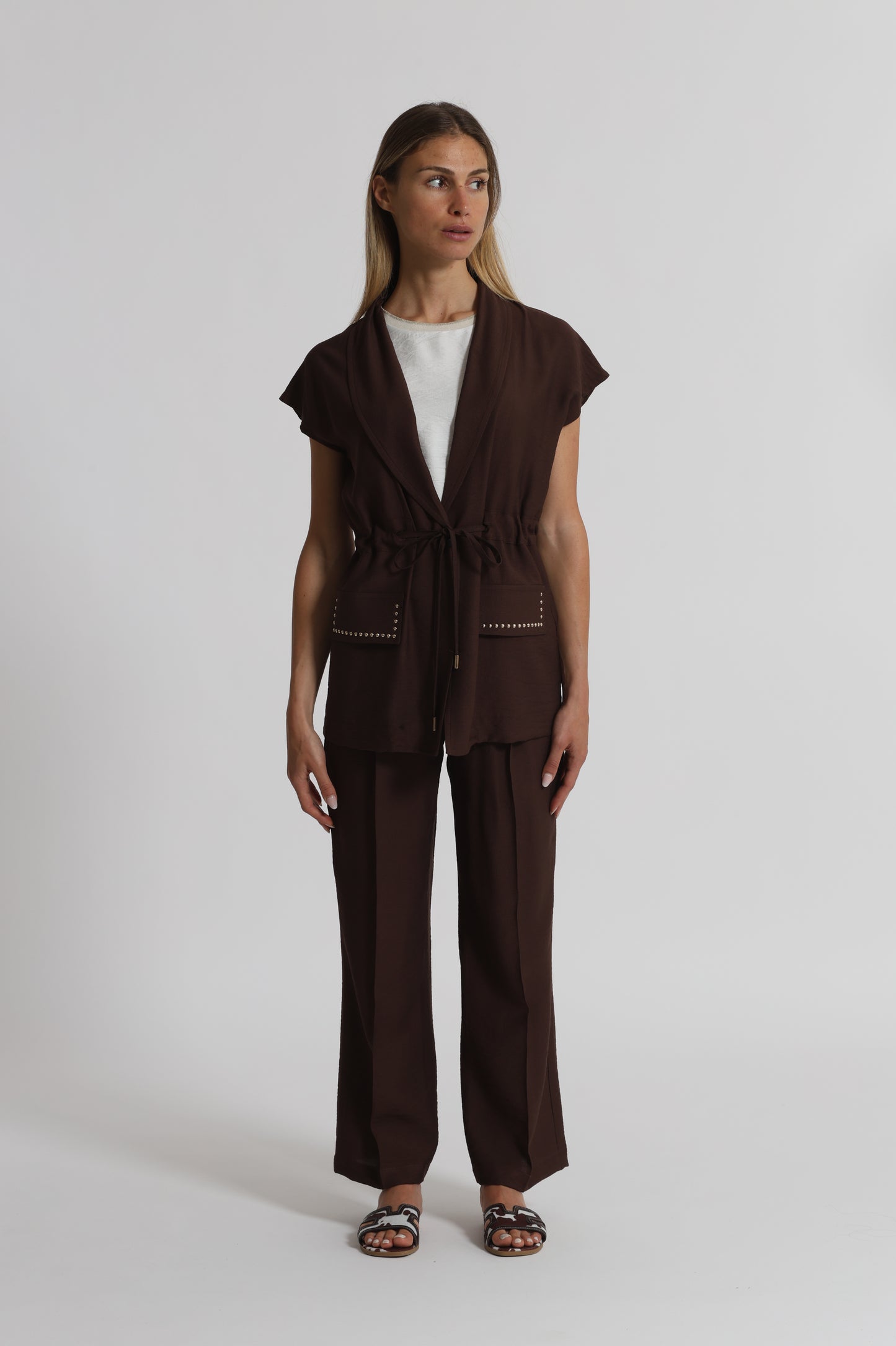 GIACCA CON DETTAGLIO BORCHIE