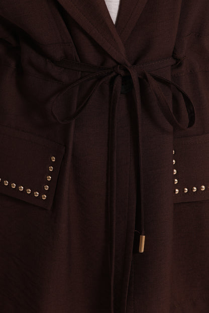 GIACCA CON DETTAGLIO BORCHIE