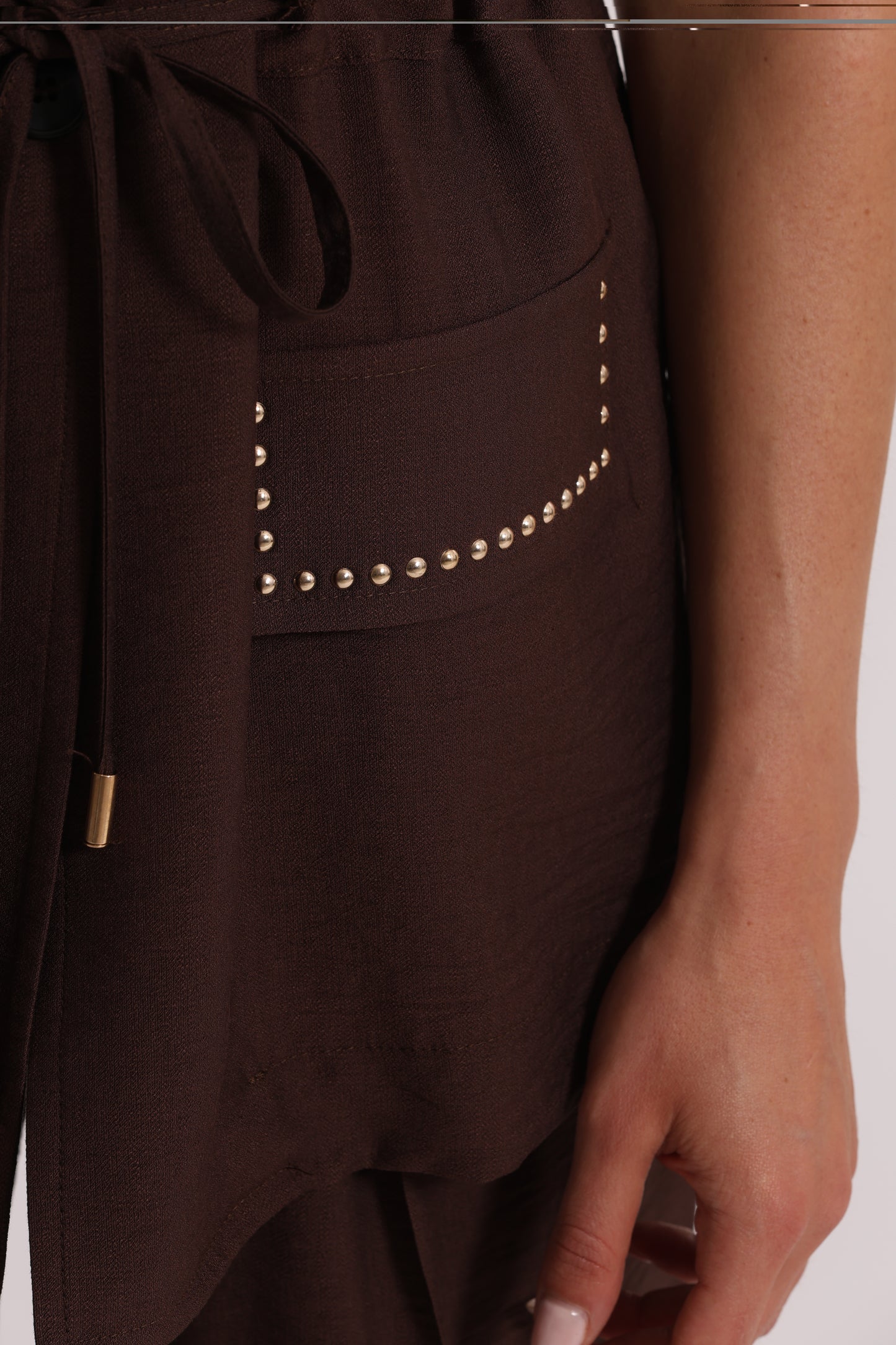 GIACCA CON DETTAGLIO BORCHIE