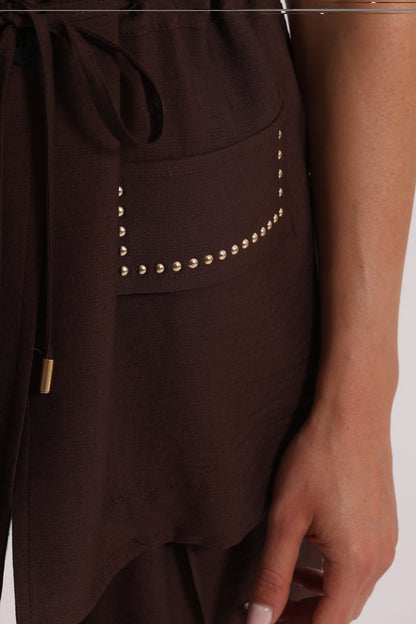 GIACCA CON DETTAGLIO BORCHIE