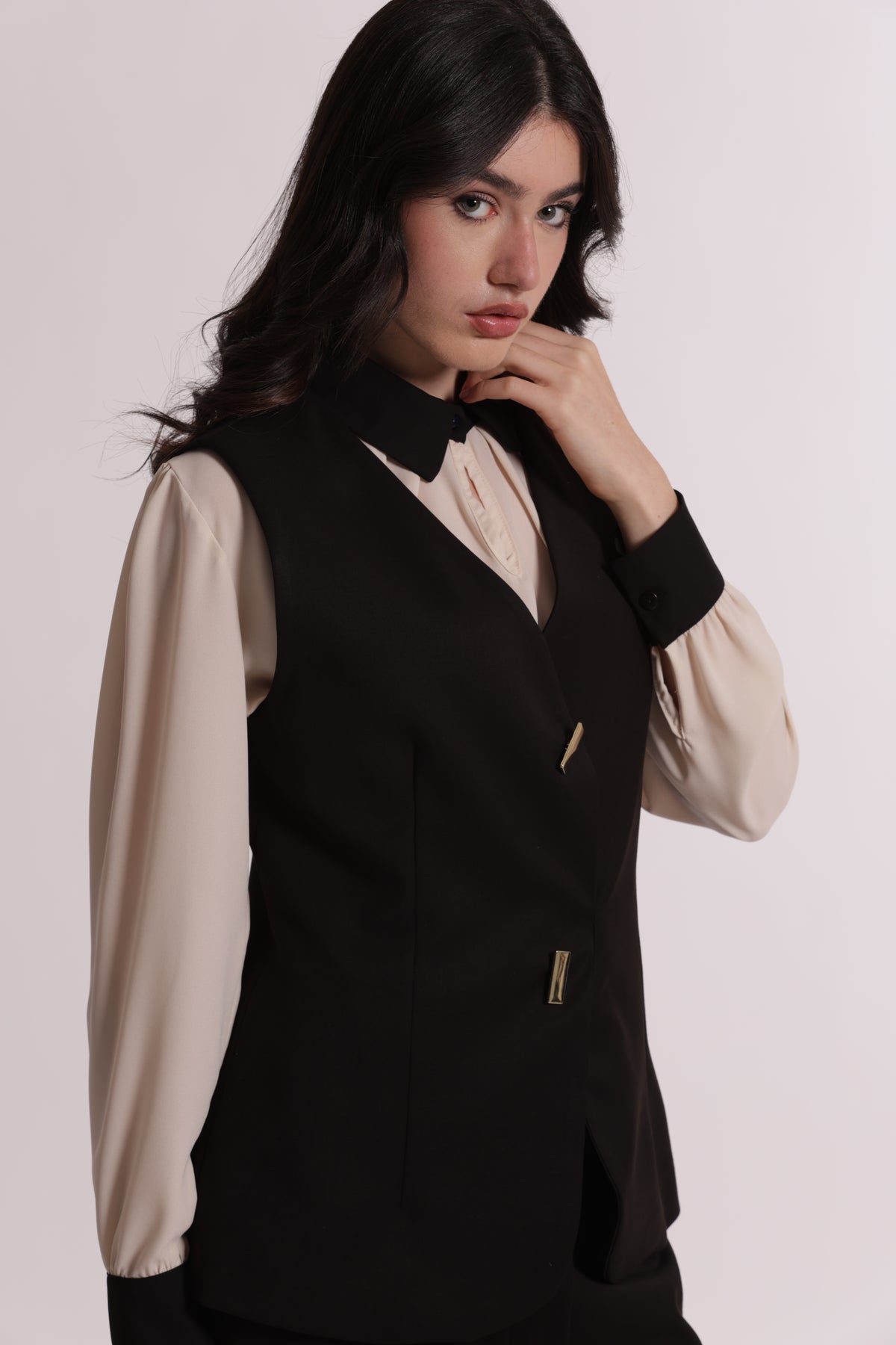 GILET CON BOTTONI METALLICI