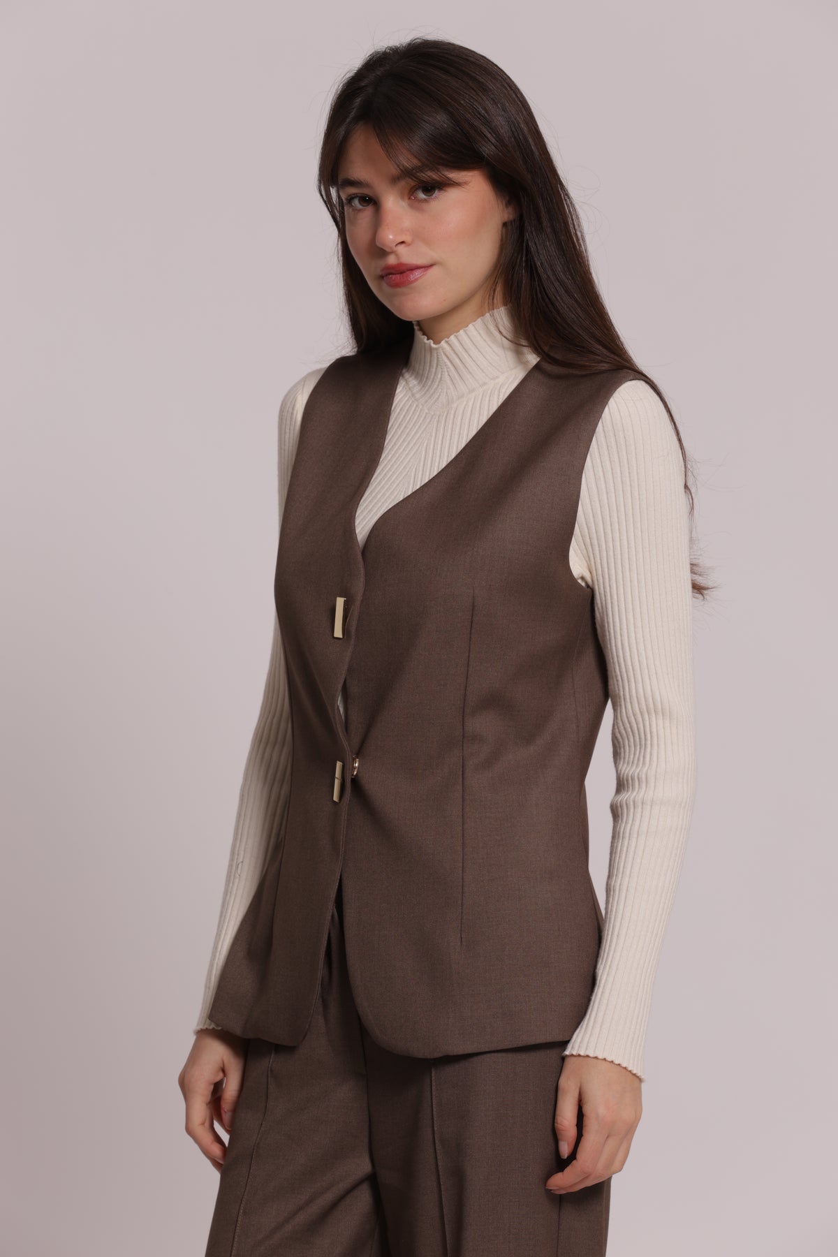 GILET CON BOTTONI METALLICI