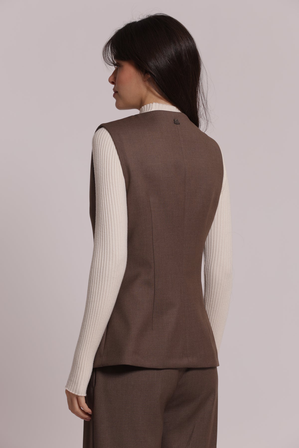 GILET CON BOTTONI METALLICI