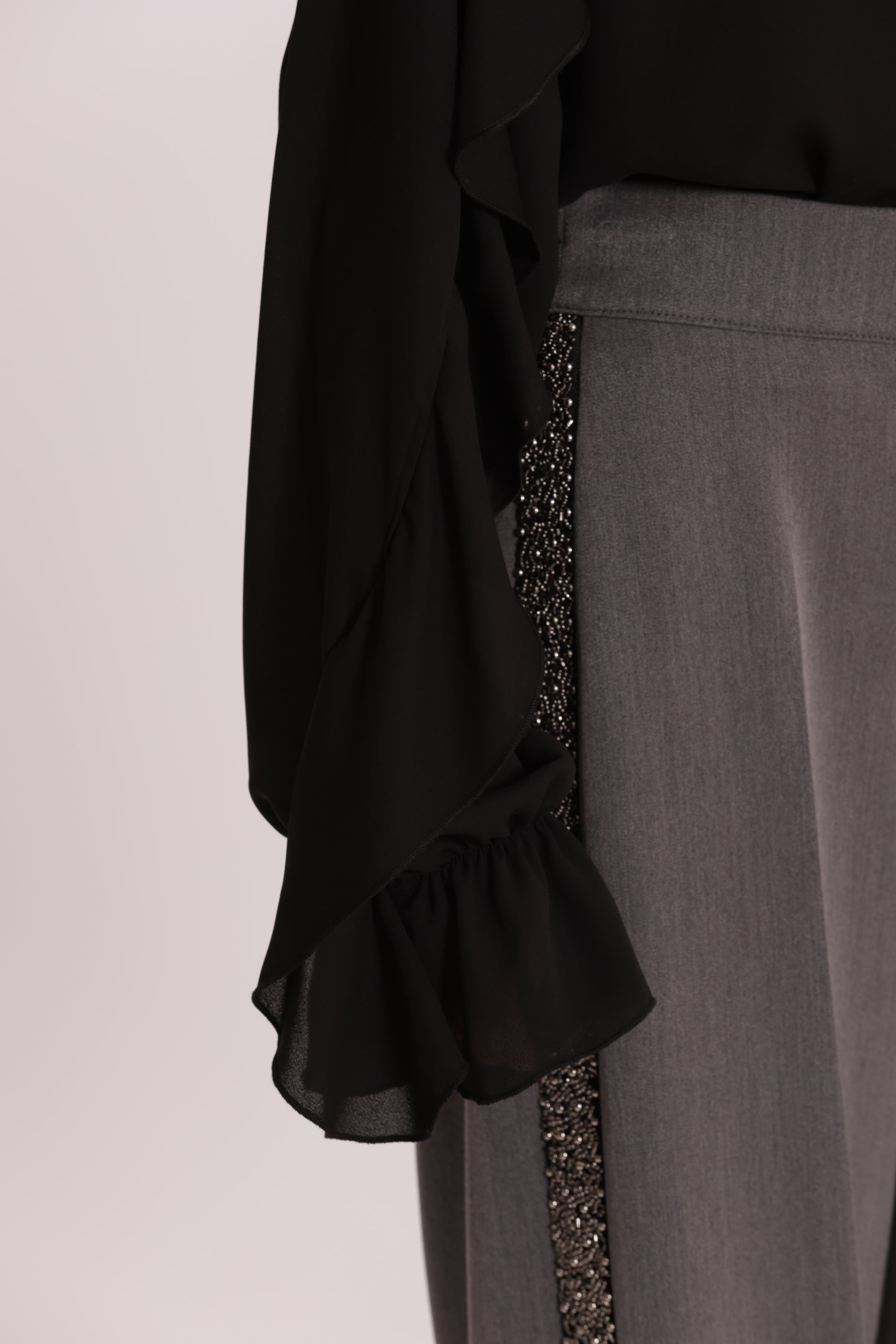 BLUSA CON ROUCHES