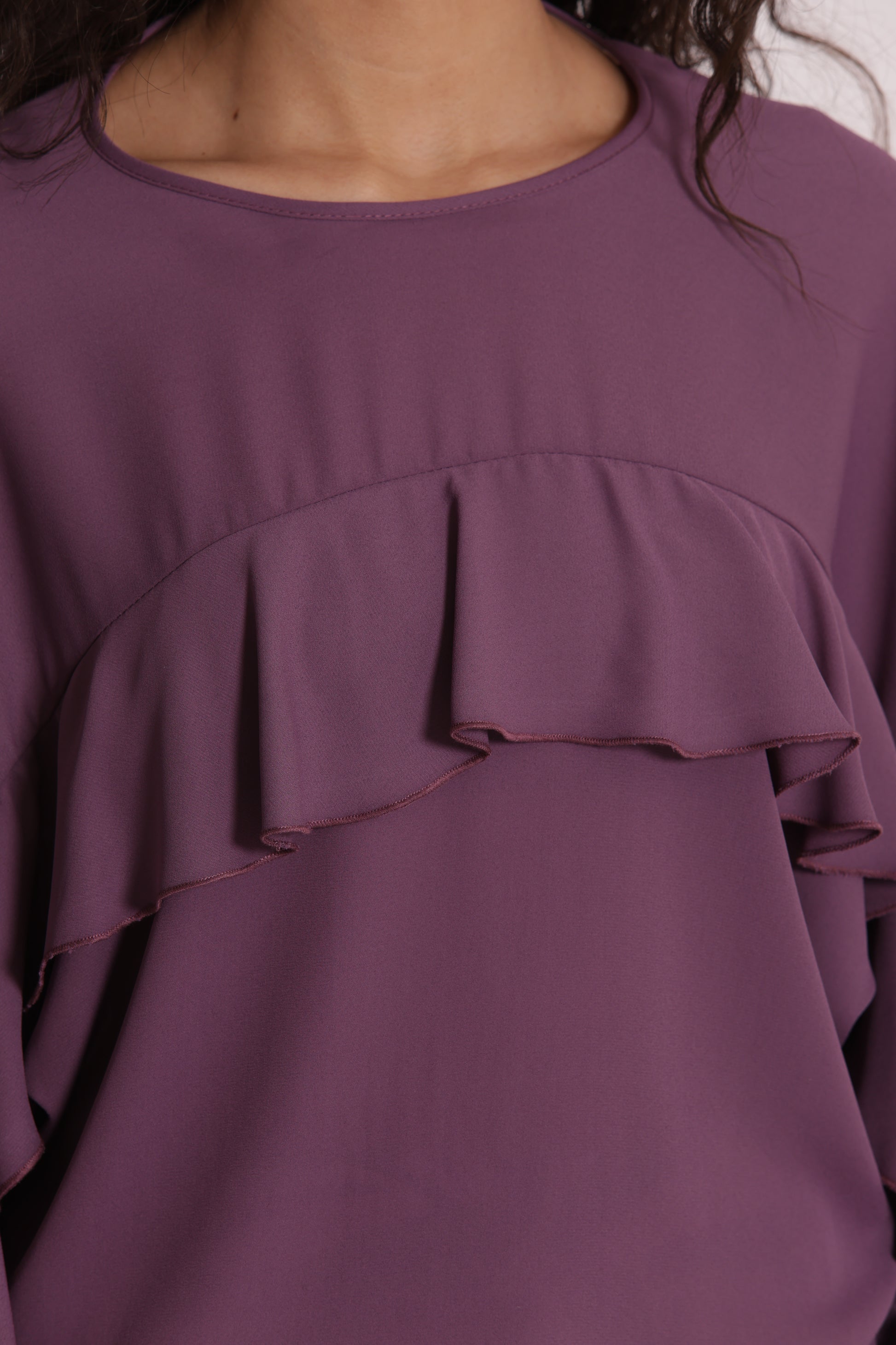 BLUSA CON ROUCHES