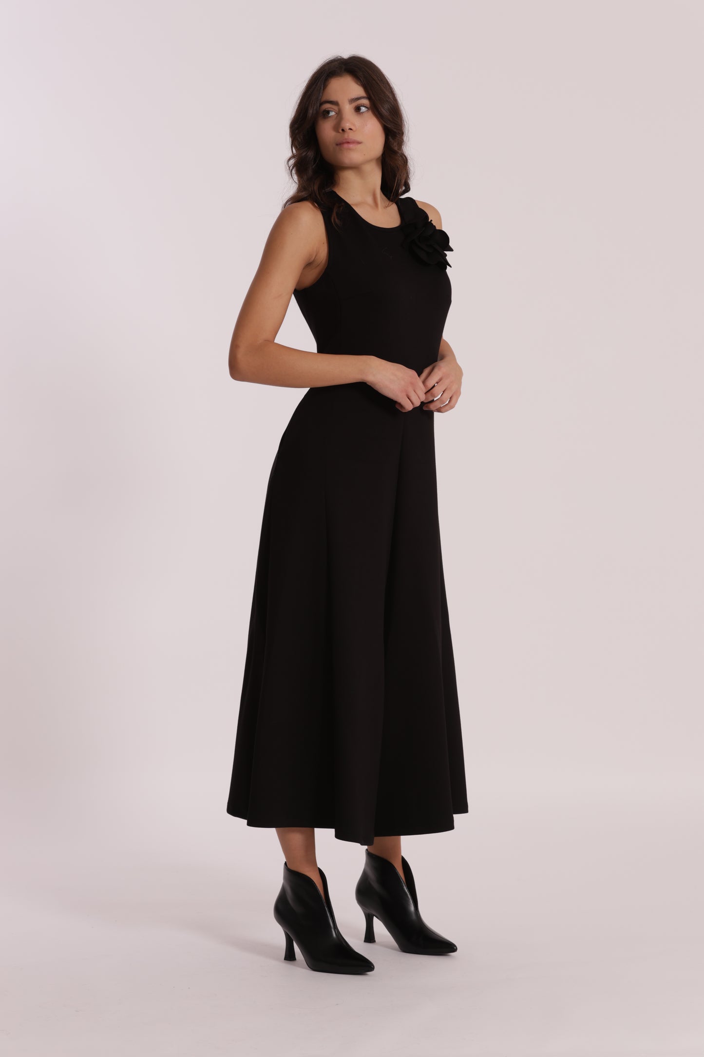 TUTA IN NEOPRENE CON FIORE