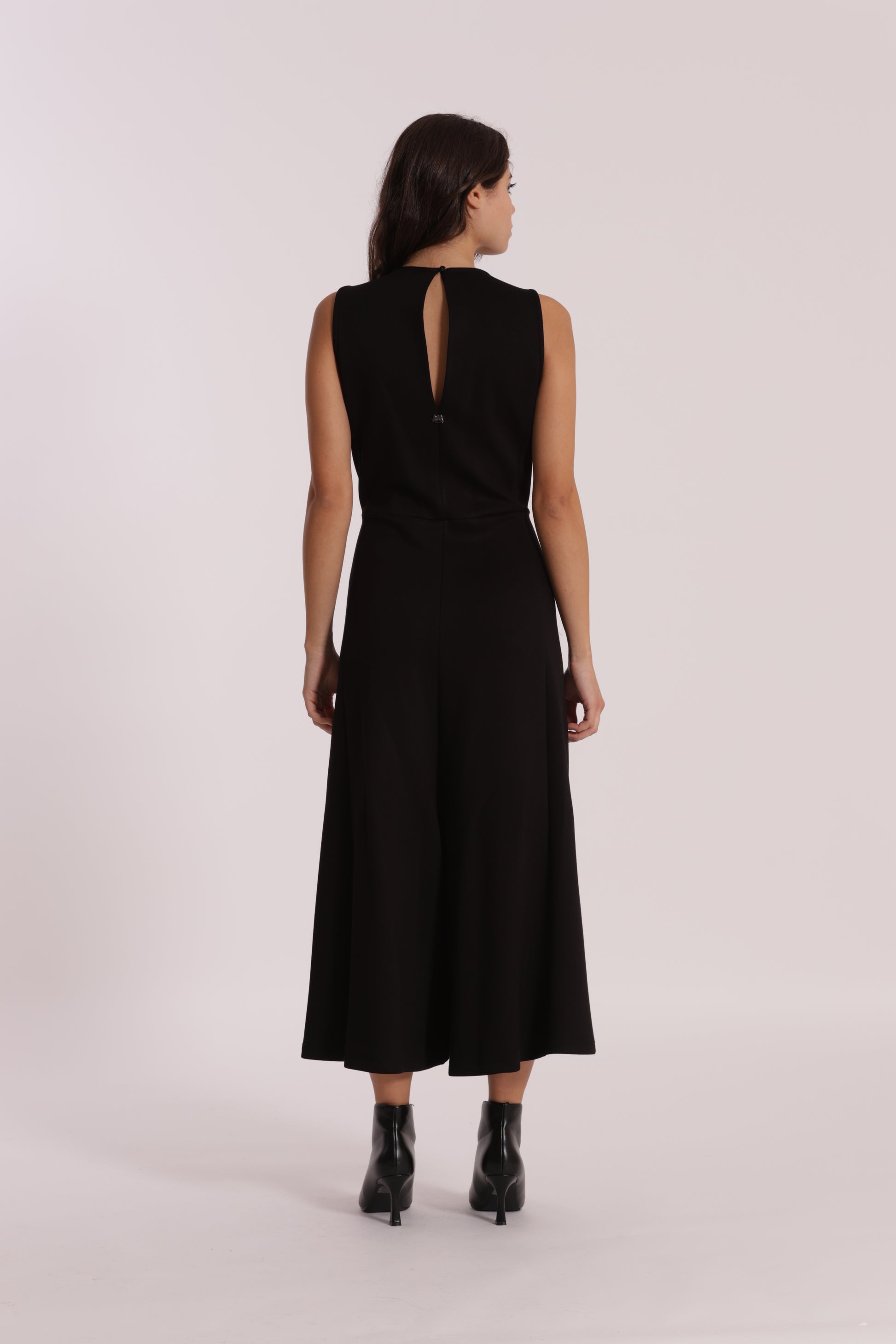 TUTA IN NEOPRENE CON FIORE