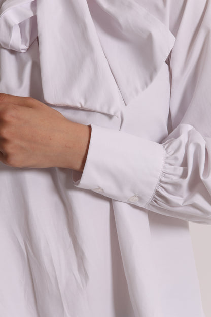 BLUSA A MANICHE LUNGHE CON DETTAGLIO FIOCCO