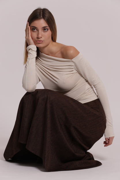 BLUSA CON SCOLLO ASIMMETRICO