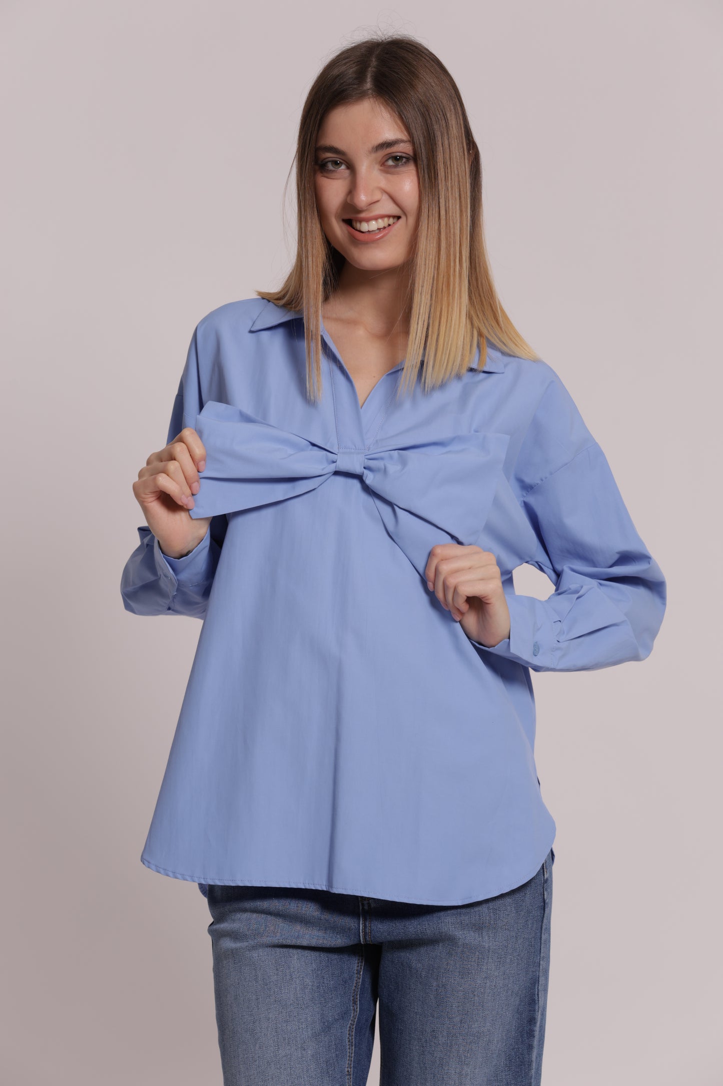 BLUSA CON FIOCCO FRONTALE