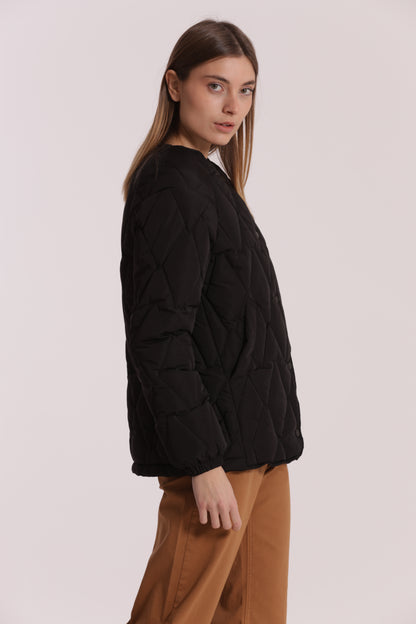 PIUMINO CORTO OVER CON TRAMA ZIG-ZAG