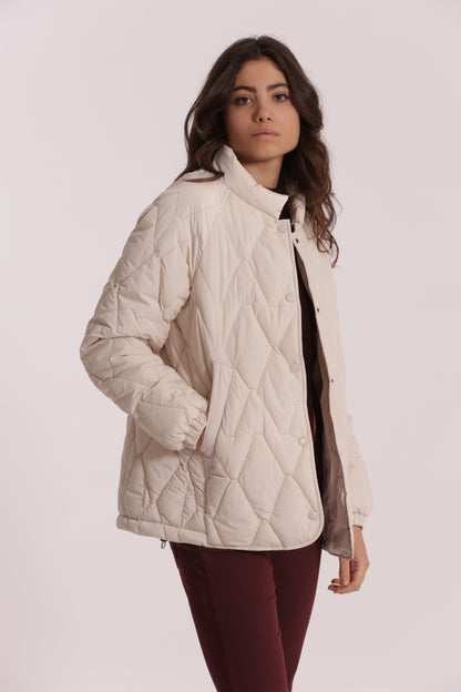 PIUMINO CORTO OVER CON TRAMA ZIG-ZAG