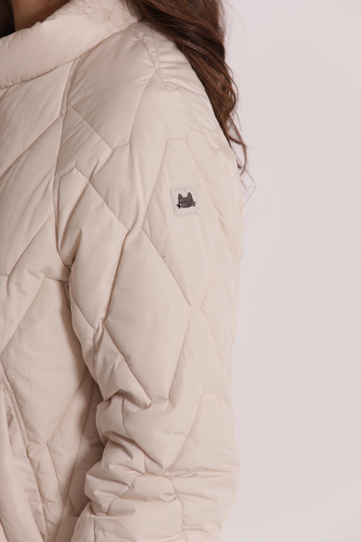 PIUMINO CORTO OVER CON TRAMA ZIG-ZAG