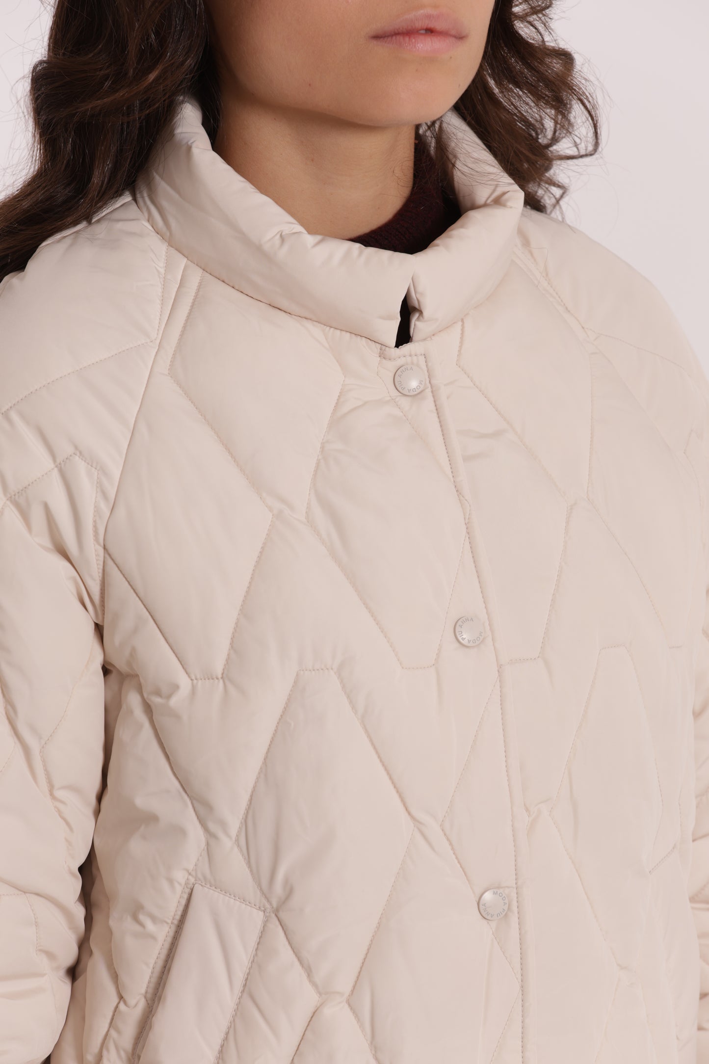 PIUMINO CORTO OVER CON TRAMA ZIG-ZAG