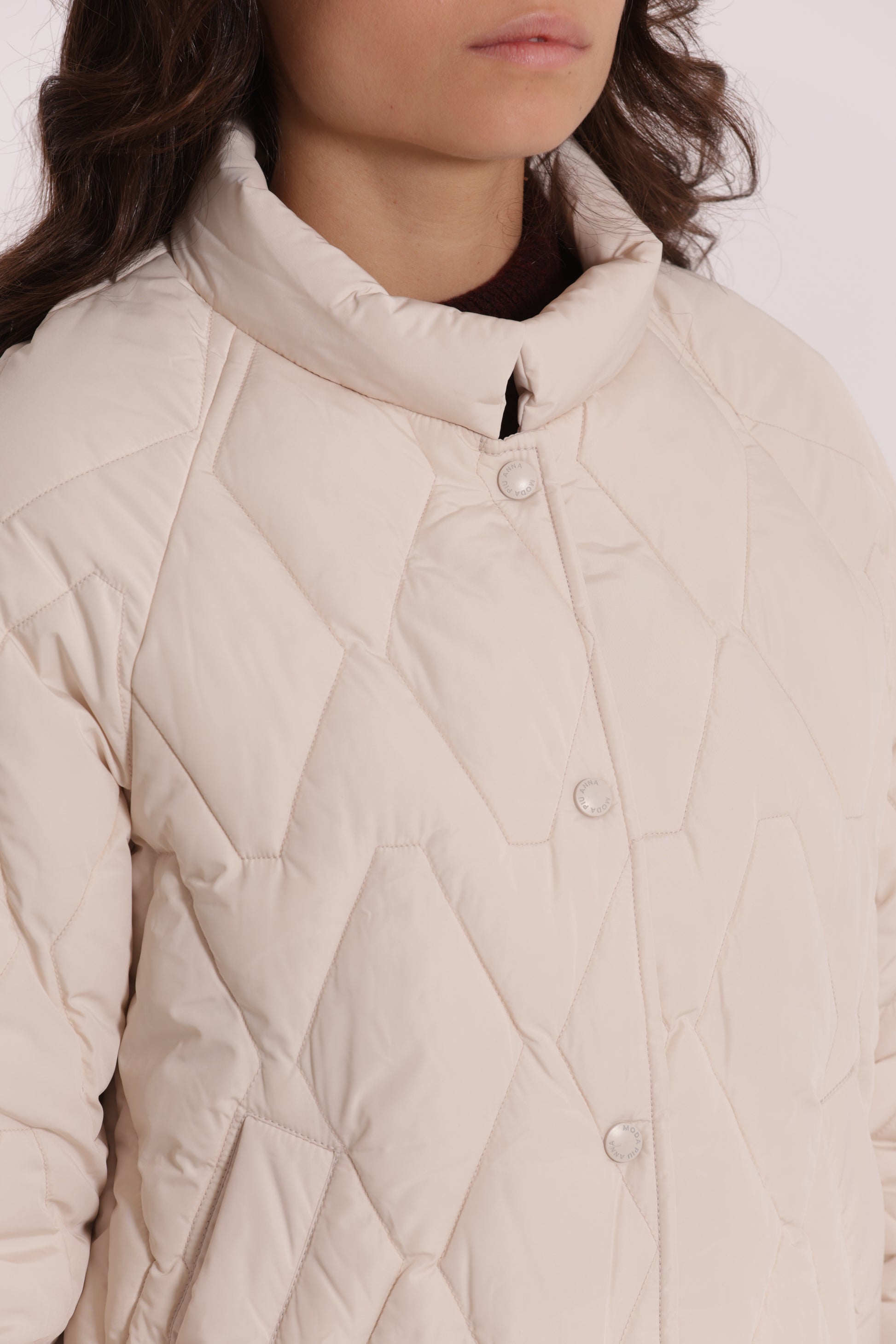 PIUMINO CORTO OVER CON TRAMA ZIG-ZAG