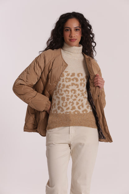 PIUMINO CORTO OVER CON TRAMA ZIG-ZAG