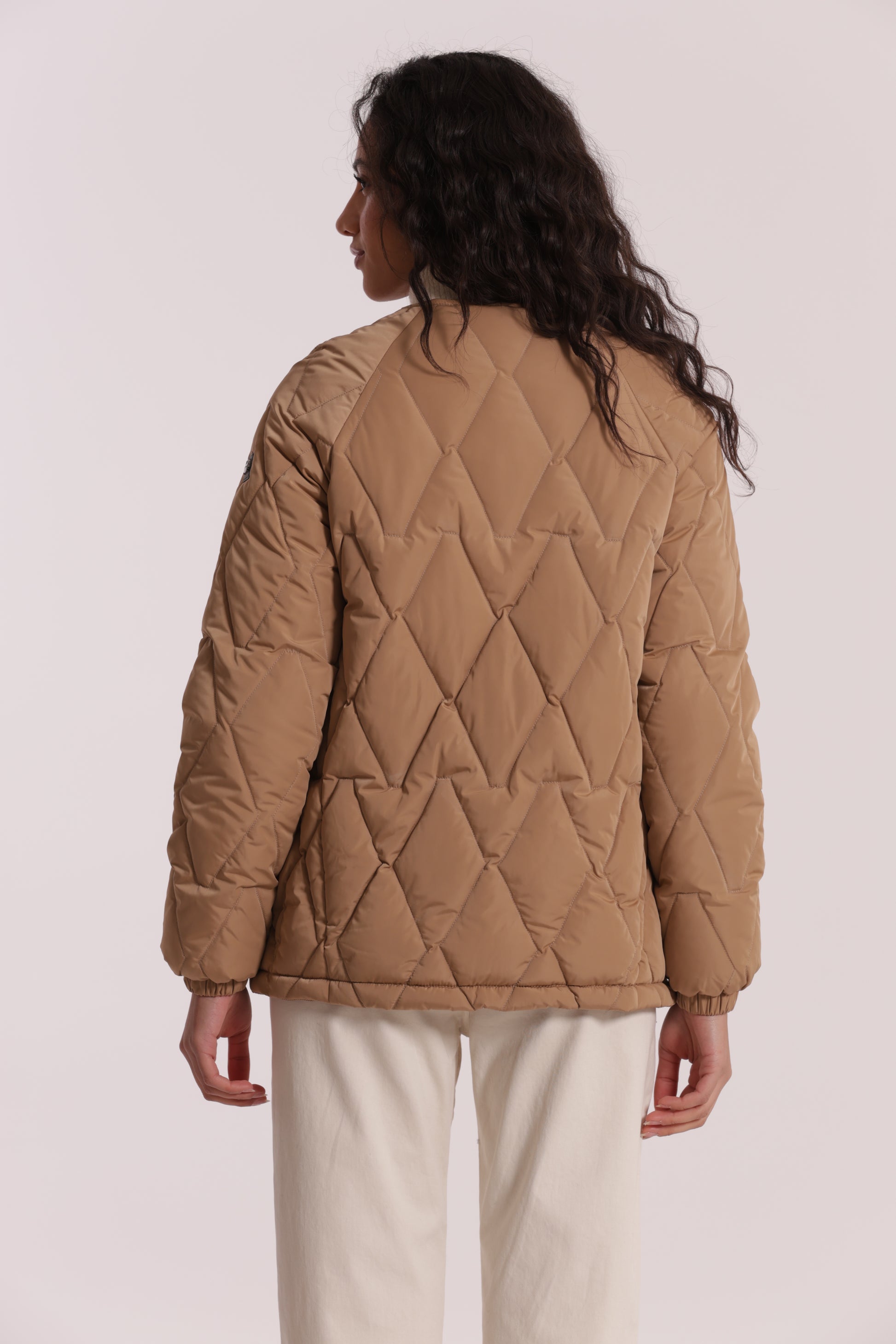 PIUMINO CORTO OVER CON TRAMA ZIG-ZAG