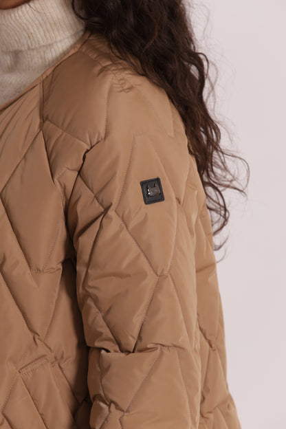 PIUMINO CORTO OVER CON TRAMA ZIG-ZAG