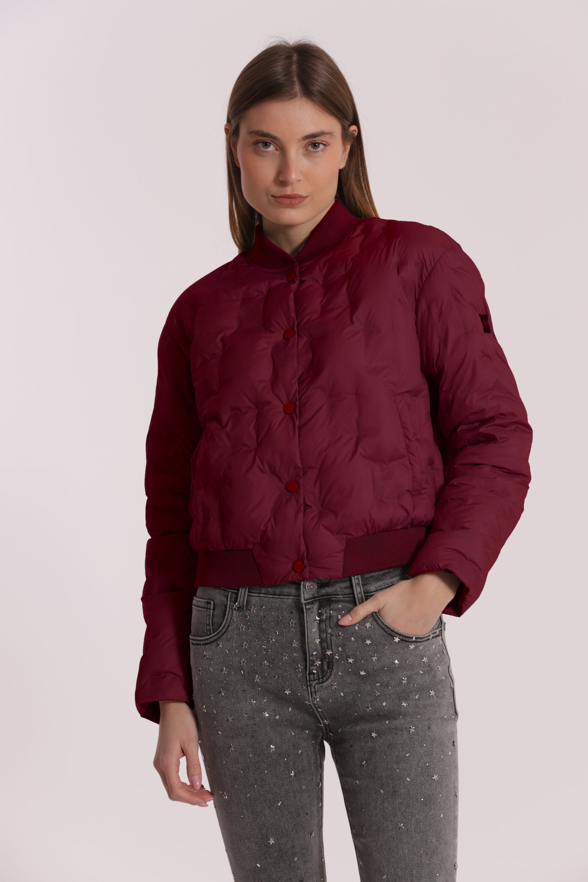 PIUMINO CORTO CON TRAMA GEOMETRICA