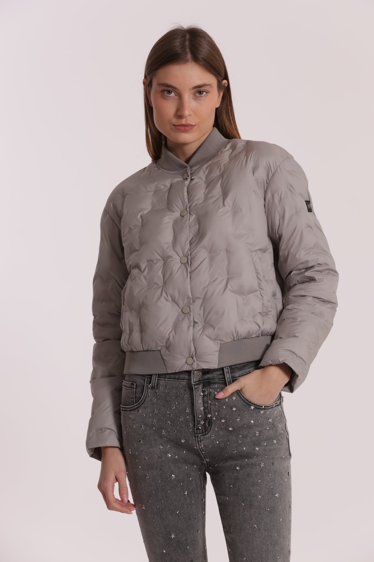 PIUMINO CORTO CON TRAMA GEOMETRICA