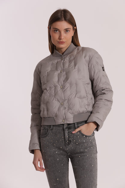 PIUMINO CORTO CON TRAMA GEOMETRICA