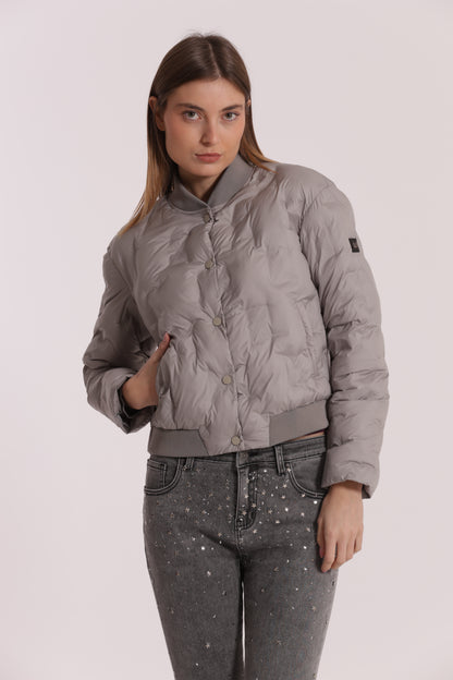 PIUMINO CORTO CON TRAMA GEOMETRICA