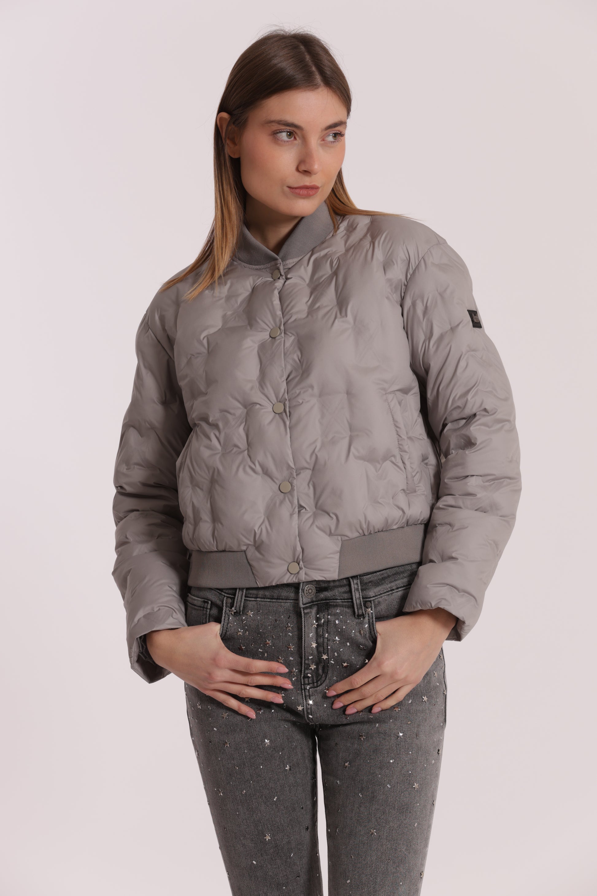 PIUMINO CORTO CON TRAMA GEOMETRICA