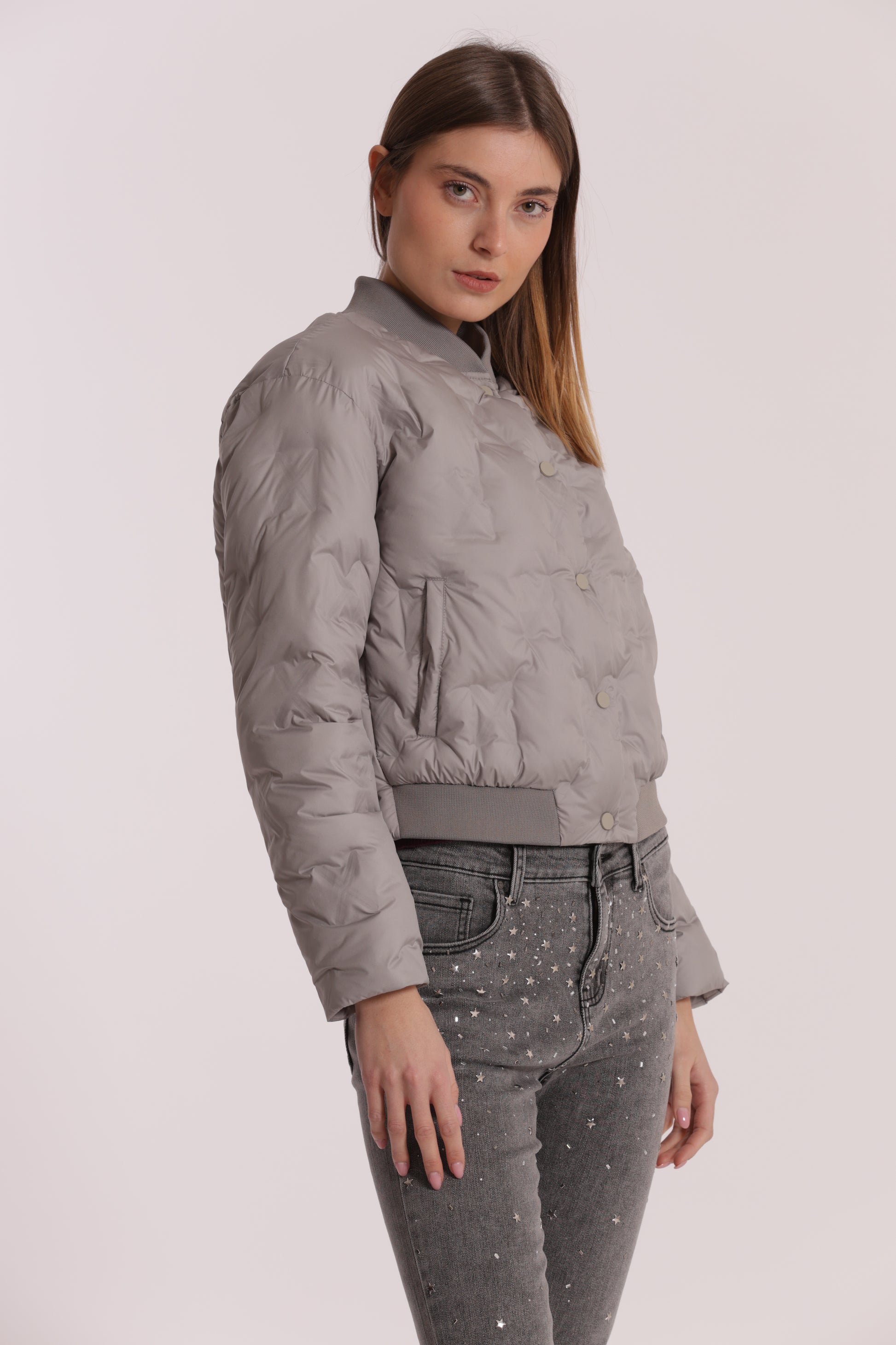 PIUMINO CORTO CON TRAMA GEOMETRICA