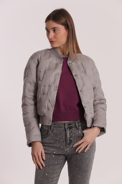 PIUMINO CORTO CON TRAMA GEOMETRICA