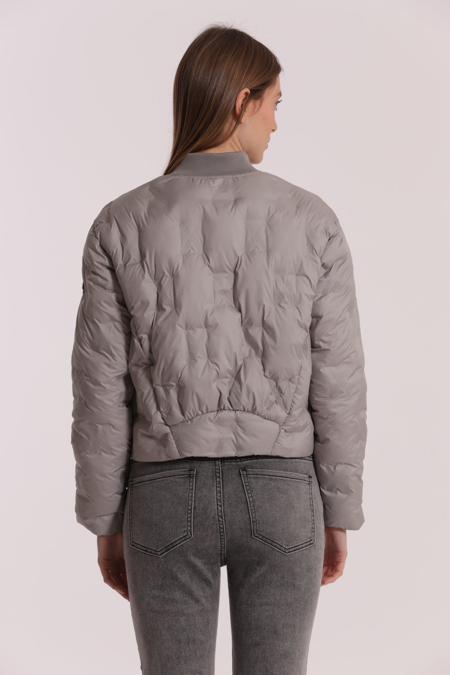 PIUMINO CORTO CON TRAMA GEOMETRICA