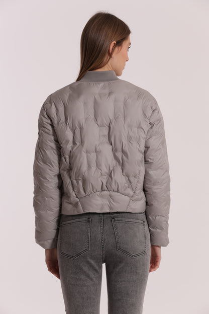 PIUMINO CORTO CON TRAMA GEOMETRICA