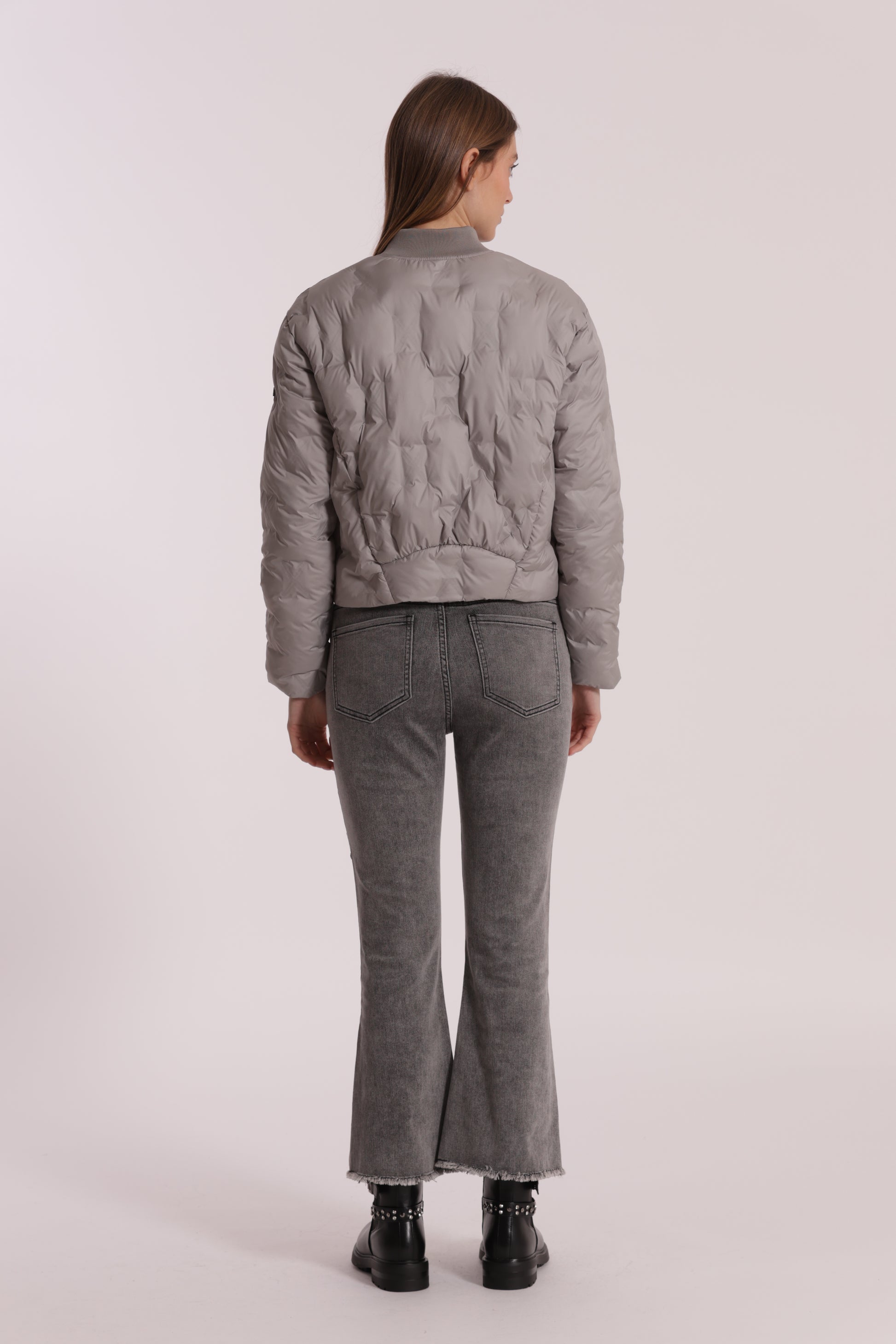 PIUMINO CORTO CON TRAMA GEOMETRICA