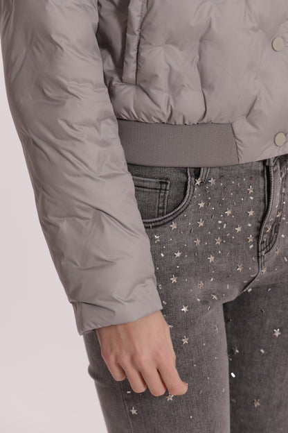 PIUMINO CORTO CON TRAMA GEOMETRICA