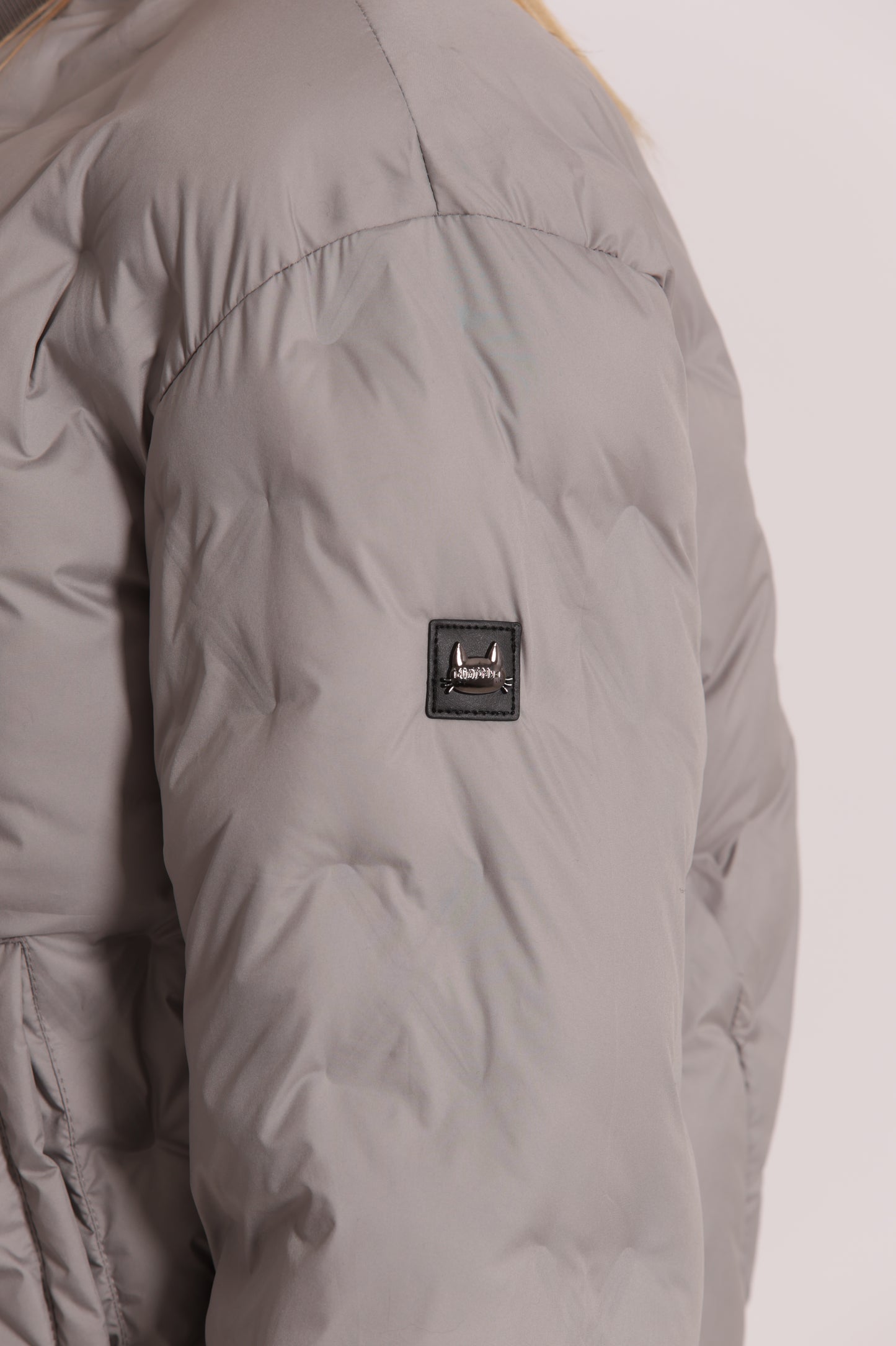 PIUMINO CORTO CON TRAMA GEOMETRICA