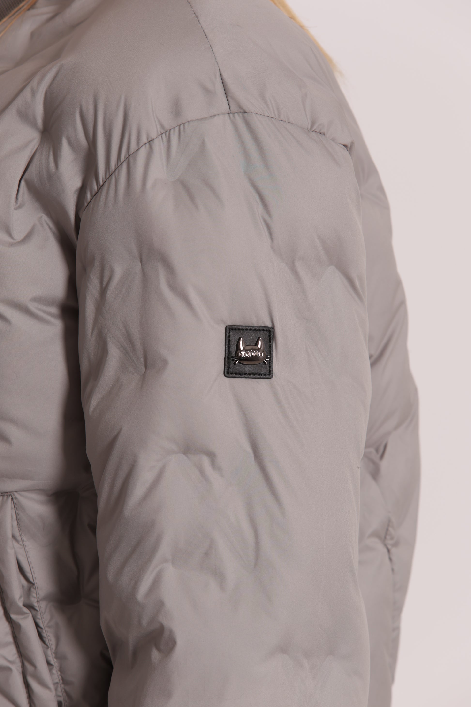 PIUMINO CORTO CON TRAMA GEOMETRICA