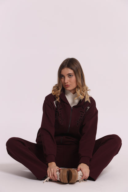FELPA CON ZIP DETTAGLI TRAFORATI E STRASS