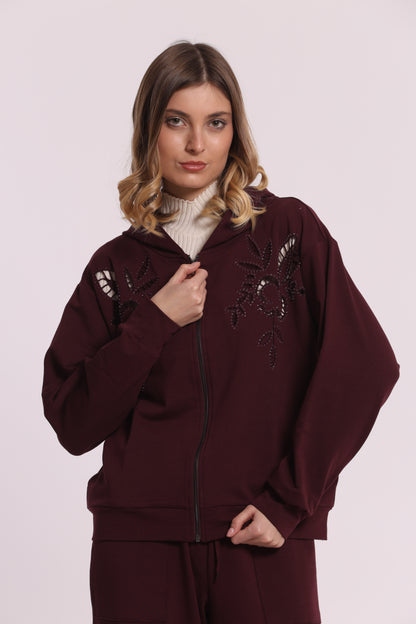 FELPA CON ZIP DETTAGLI TRAFORATI E STRASS