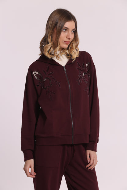 FELPA CON ZIP DETTAGLI TRAFORATI E STRASS