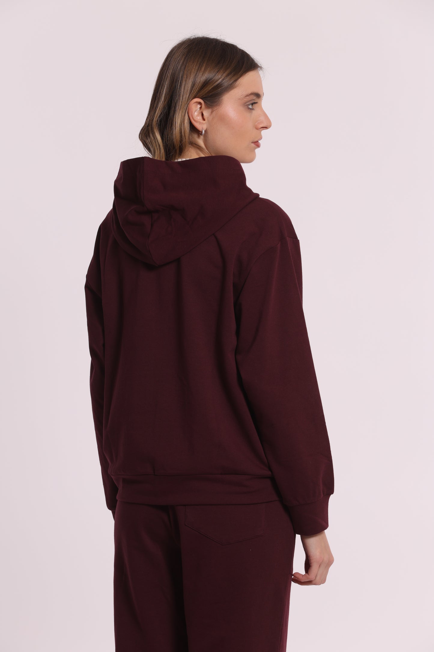FELPA CON ZIP DETTAGLI TRAFORATI E STRASS