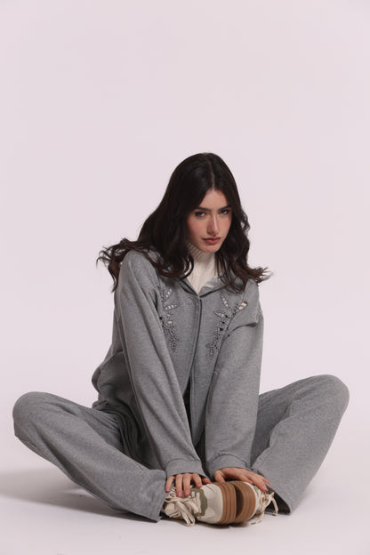 FELPA CON ZIP DETTAGLI TRAFORATI E STRASS