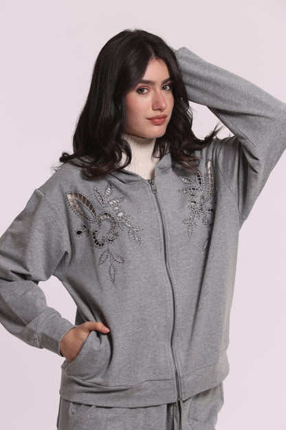 FELPA CON ZIP DETTAGLI TRAFORATI E STRASS