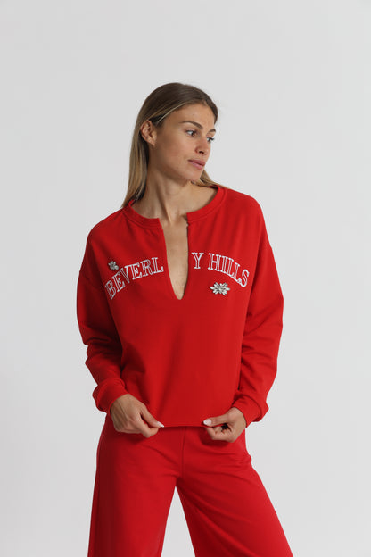 FELPA "BEVERLY HILLS" CON SCOLLO A V E DETTAGLI IN STRASS