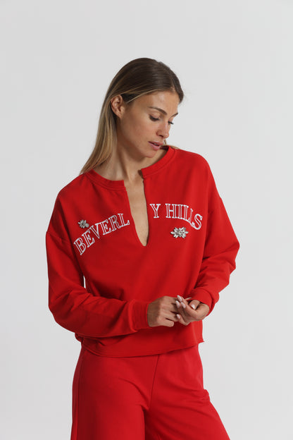 FELPA "BEVERLY HILLS" CON SCOLLO A V E DETTAGLI IN STRASS