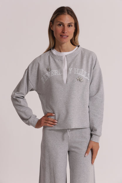 FELPA "BEVERLY HILLS" CON SCOLLO A V E DETTAGLI IN STRASS