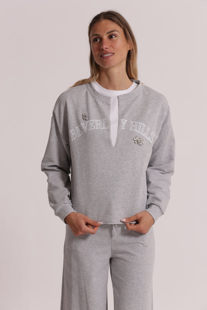 FELPA "BEVERLY HILLS" CON SCOLLO A V E DETTAGLI IN STRASS