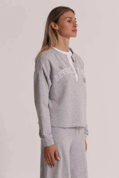 FELPA "BEVERLY HILLS" CON SCOLLO A V E DETTAGLI IN STRASS