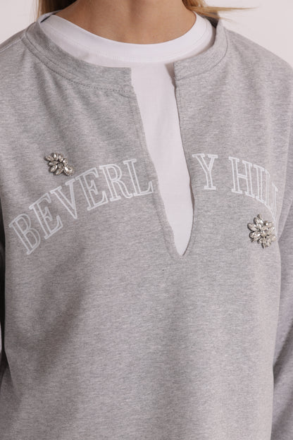 FELPA "BEVERLY HILLS" CON SCOLLO A V E DETTAGLI IN STRASS