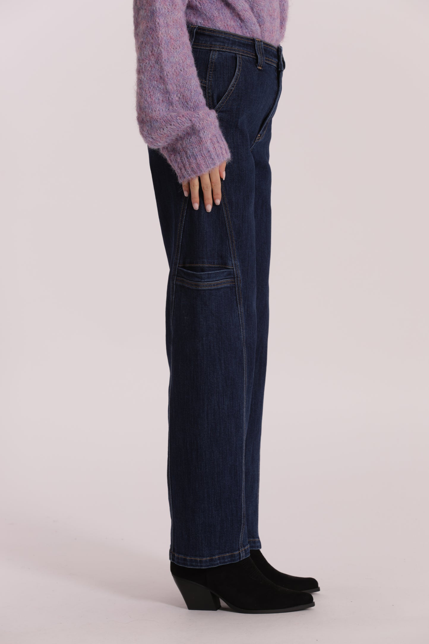 JEANS CON FINTE TASCHE LATERALI