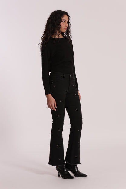 JEANS FLARE CON BORCHIE CUORE